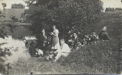 People by lake