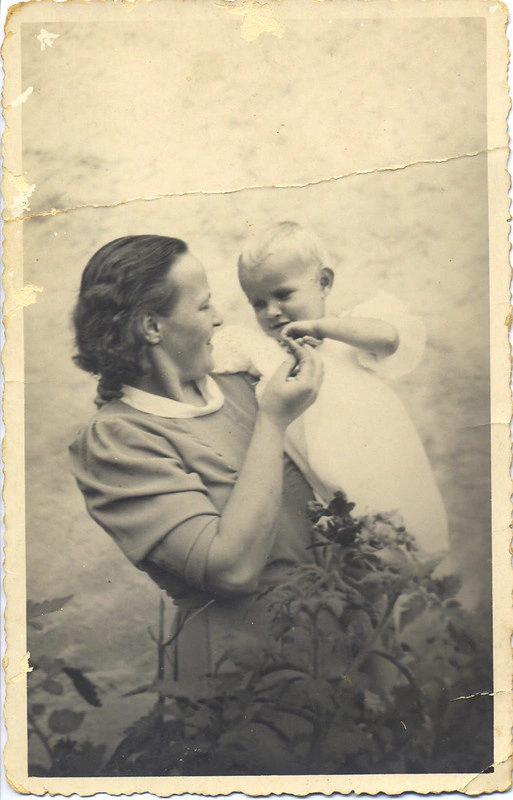 Mother holding toddler