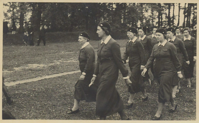 Women in uniform marching