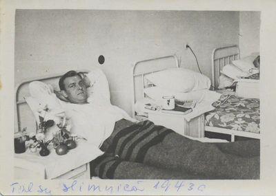 Augusts in hospital bed